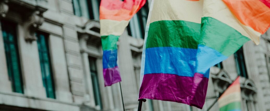 lgbt+ pride flag flying in the sky