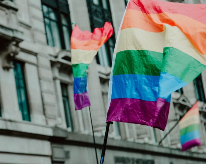 lgbt+ pride flag flying in the sky