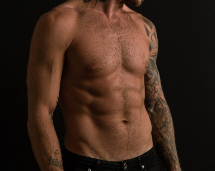 Topless man with a good physique - as you'd expect in a Magic Mike show!