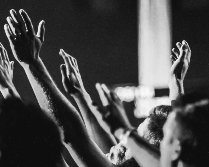 Black and White crowd cheering and clapping