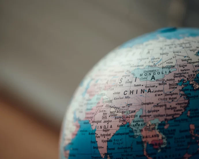 Image of a globe of the world, with China at the centre of the image. This reflects the article's depiction of China being a hot topic at the g7 Summit 2023
