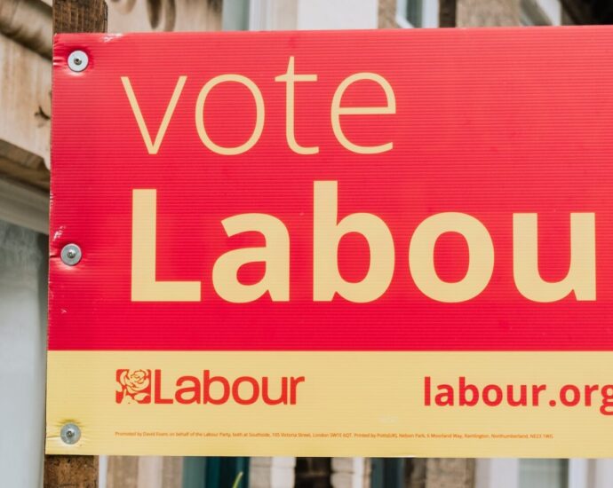 A political banner displaying 'vote Labour'.