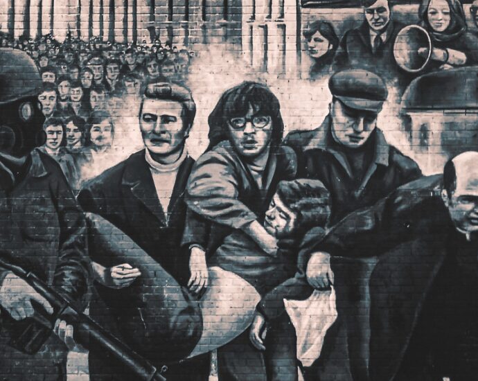 A mural at Free Derry Corner in Londonderry depicting Bloody Sunday, a significant historical event in Northern Ireland's Civil War.