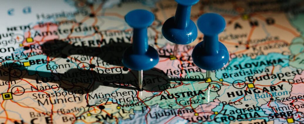 blue pins on a map colourful map. Euro summer.