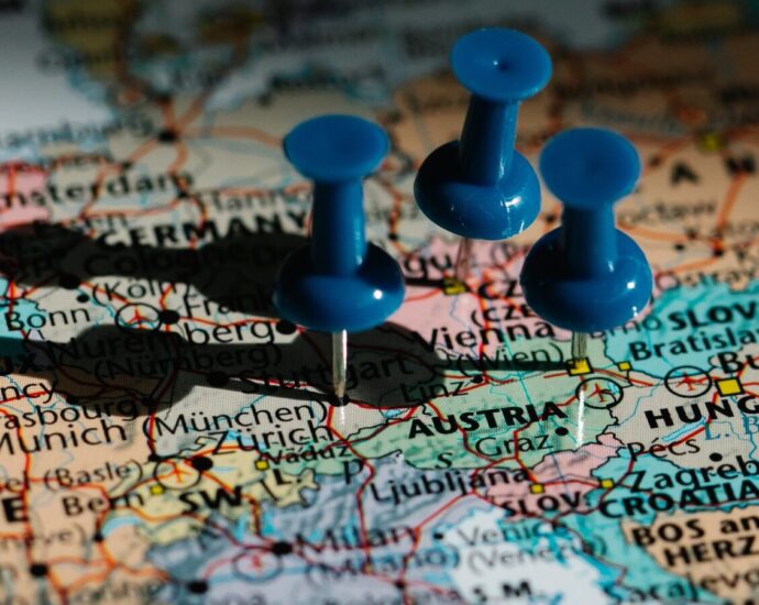 blue pins on a map colourful map. Euro summer.