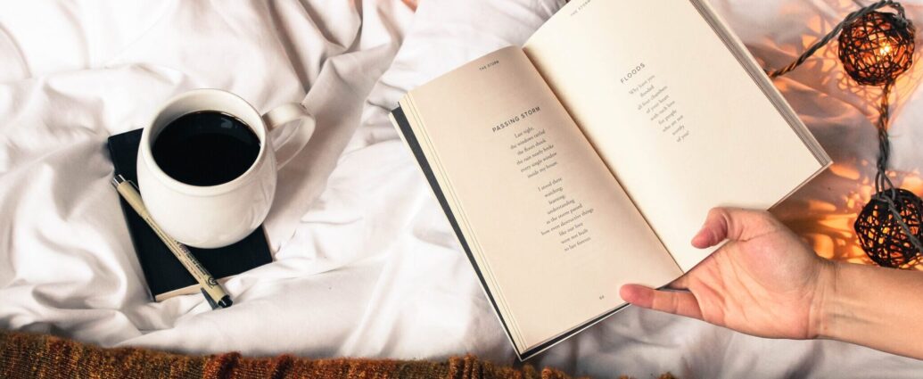woman reading in her bed