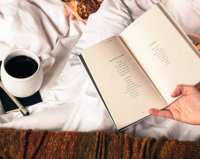 woman reading in her bed