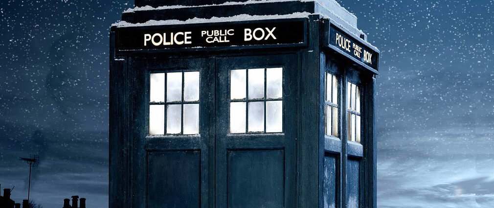 Image shows the TARDIS against a nighttime backdrop.