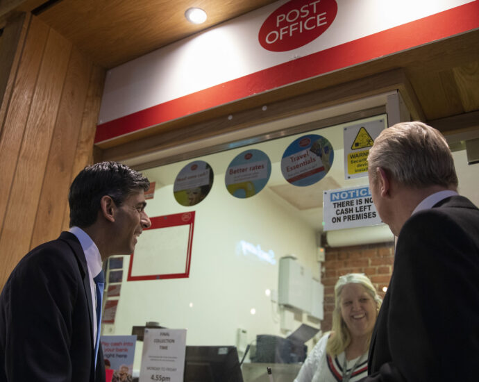 Rishi Sunak visiting a community Post Office in North London, February 2022.