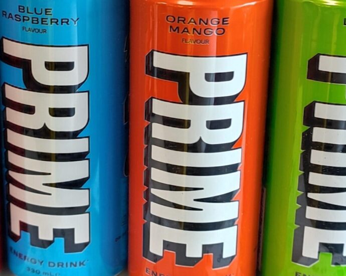 Image shows a row of brightly coloured PRIME bottles [Advertising to children]