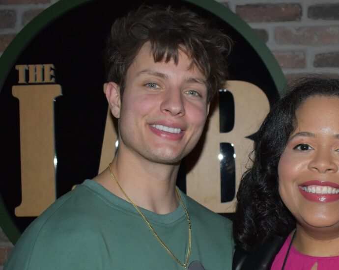 Matt Rife poses with a fan after a comedy set.