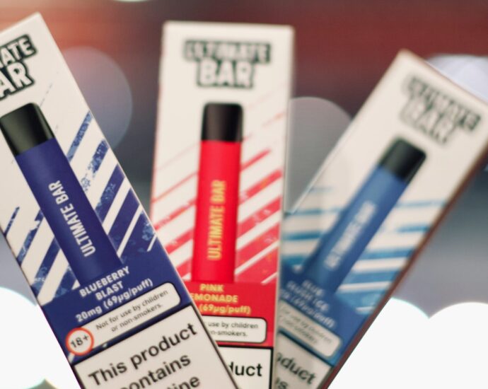 Three colourful disposable vapes, to be banned in the UK by 2025.