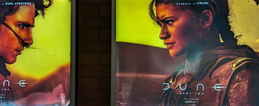 Image shows promotional posters of Timothee Chalamet and Zendaya for Dune: Part Two.