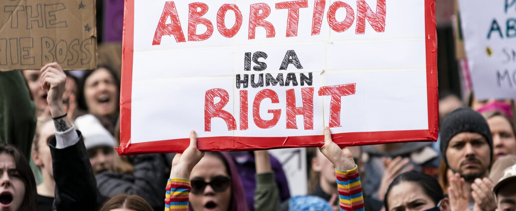 Image of pro-choice protestors at an abortion rally.
