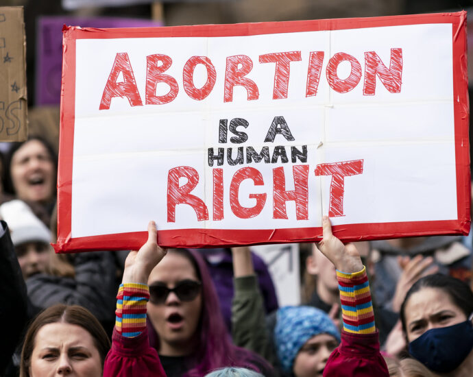 Image of pro-choice protestors at an abortion rally.