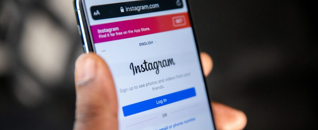 Person holding an iPhone showing Instagram log in page [Instagram political update]