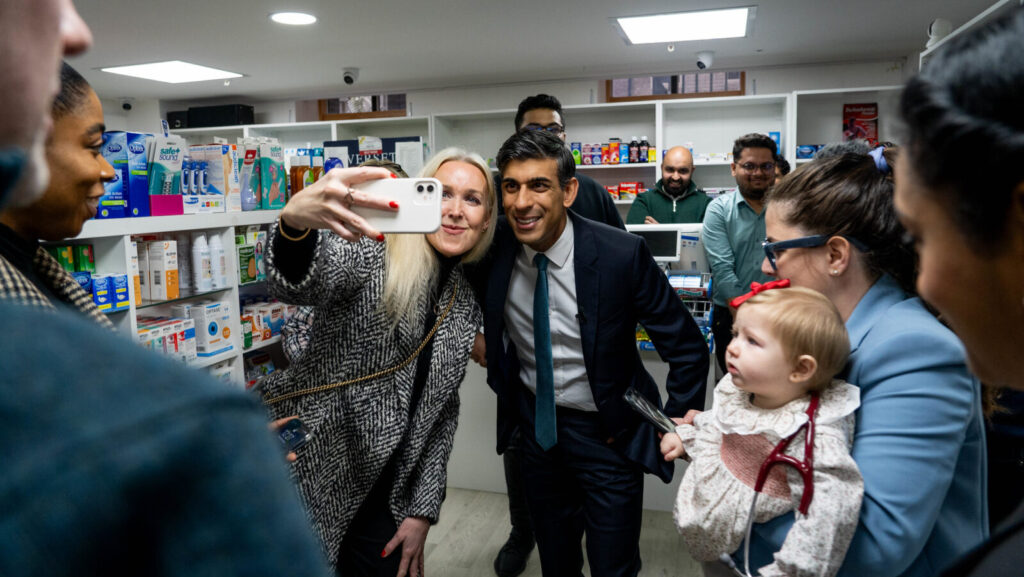 Prime Minister Rishi Sunak poses for a photo with a constituent holding a smartphone. Are politicians finally learning to communicate with the smartphone generation through social medias like TikTok?