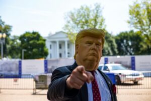 Man wearing a Donald Trump mask