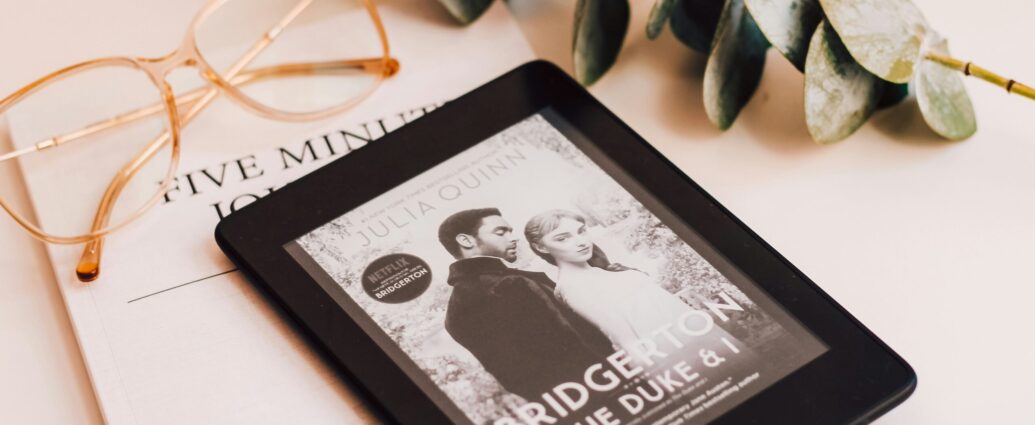 a kindle showing Bridgerton poster