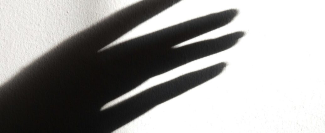 A silhouette of a hand