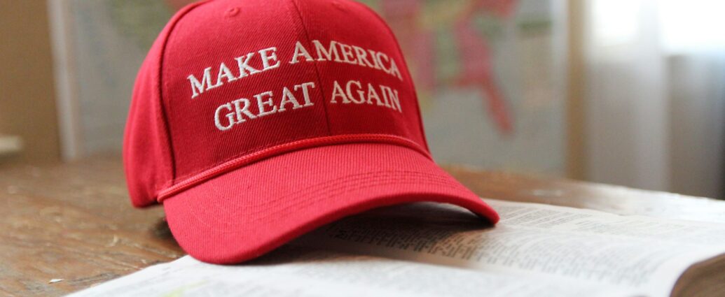 MAGA hat sitting on top of a bible.